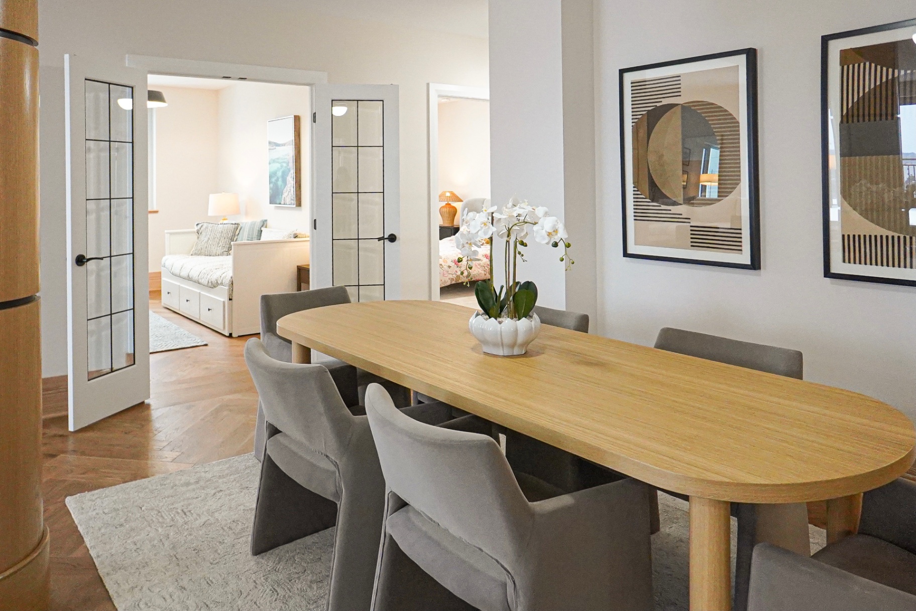 Dining area — French doors to two bedrooms